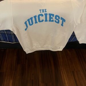 White Sweatshirt with Blue Lettering (The Juiciest) by Neutrogena.